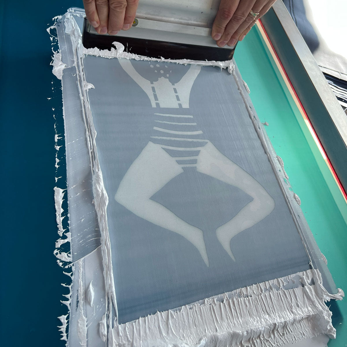 Hand silk screen printed panels for tote bags, swimmer design screenprinted in the UK